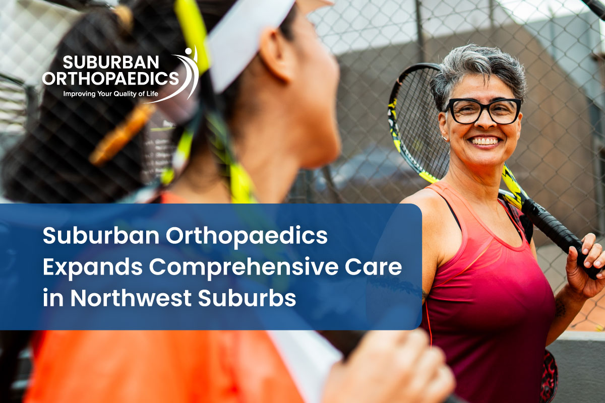 SO-Growth-031826 Two women smile at each other holding tennis rackets.